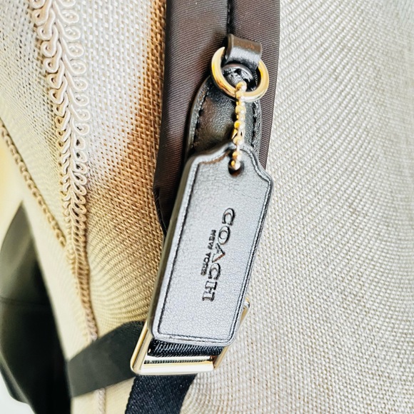 Coach Zebra MN CHRLE 39033 SV/BLACK
Coach Mini Charlie Women's Zebra Print EC - Picture 12 of 16